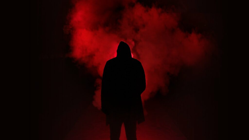 Man Standing on Road